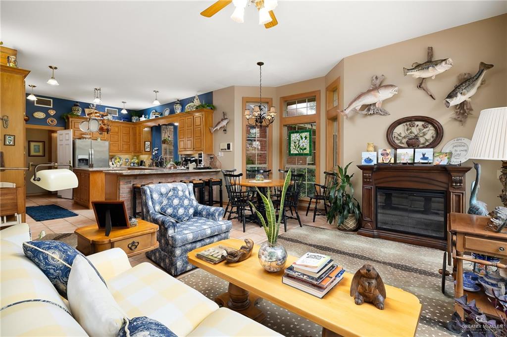 27603 Palo Verde Road San Benito, TX 78586 - Photo 15 of 45 a living room with furniture and a fireplace