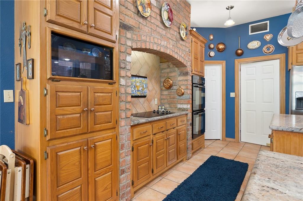 27603 Palo Verde Road San Benito, TX 78586 - Photo 17 of 45 a bathroom with a sink and a mirror