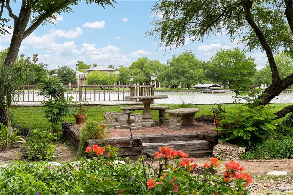 27603 Palo Verde Road San Benito, TX 78586 - Photo 41 of 45 a view of a bench in a garden