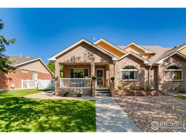 a front view of a house with a porch