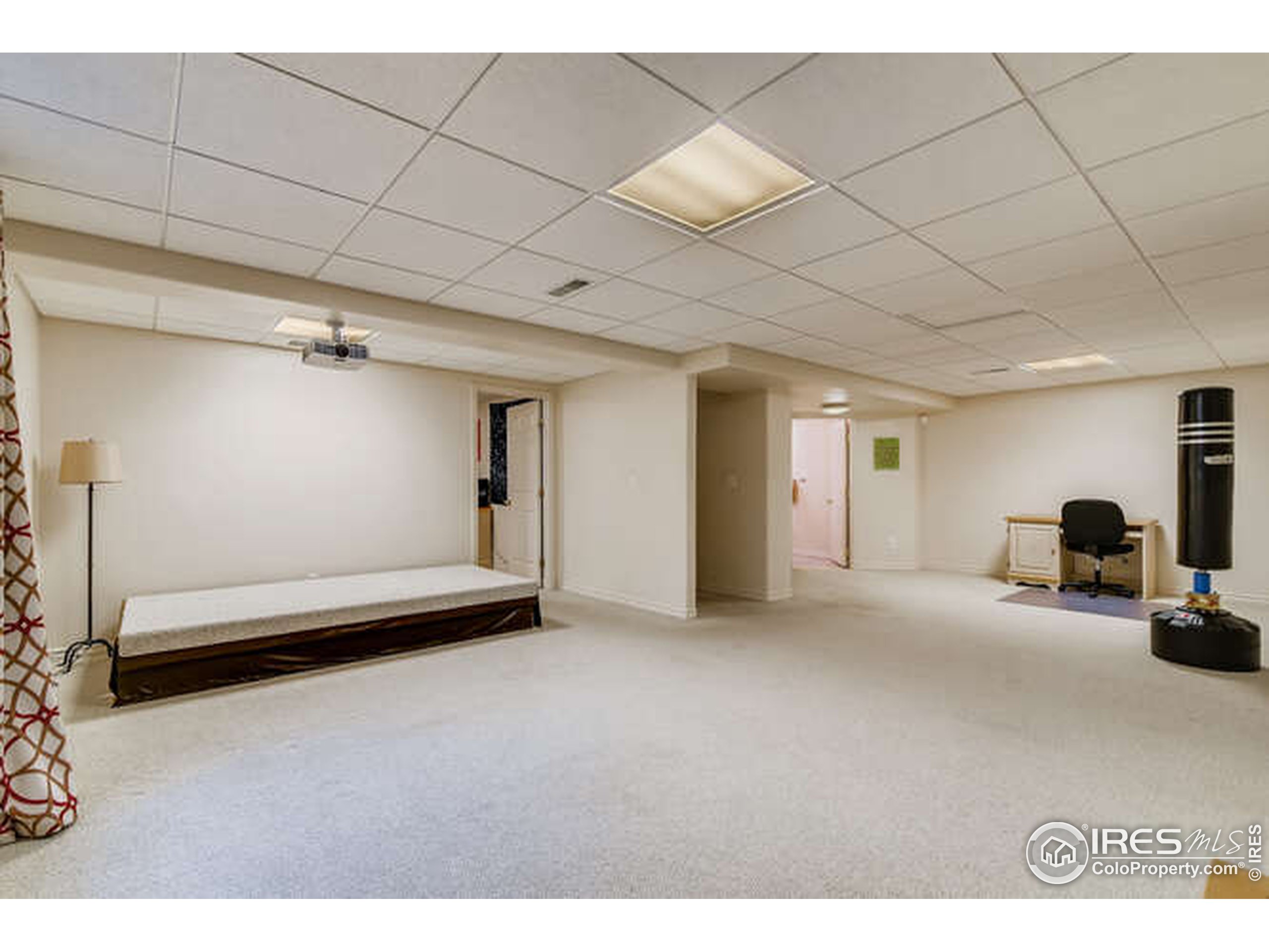 206 Victoria Street Berthoud, CO 80513 - Photo 25 of 29 a view of a livingroom with furniture and a window
