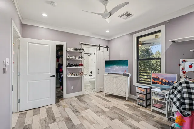 a kitchen with a refrigerator and a window