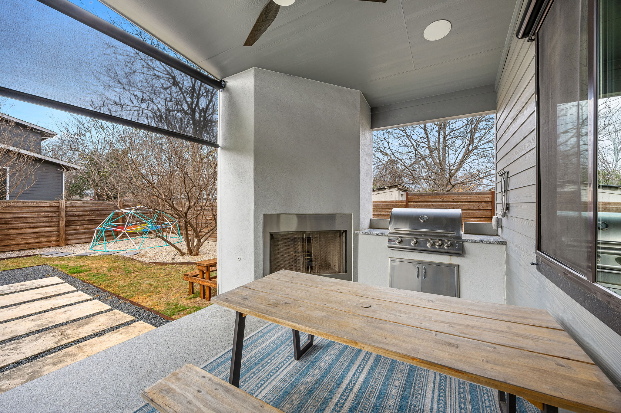 408 Martin Luther King Jr Street Georgetown, TX 78626 - Photo 21 of 35 a living room with stainless steel appliances furniture a fireplace and a flat screen tv