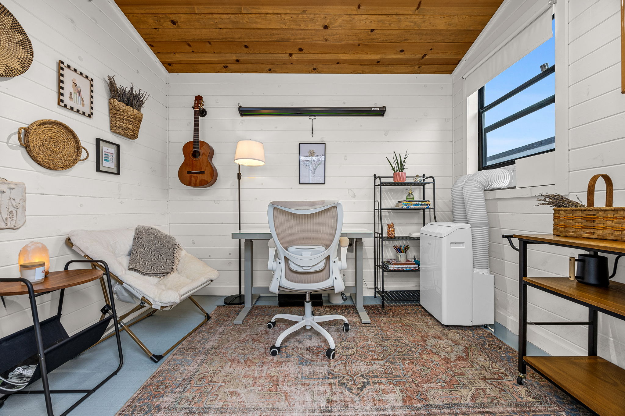408 Martin Luther King Jr Street Georgetown, TX 78626 - Photo 27 of 35 a living room with furniture and a chair