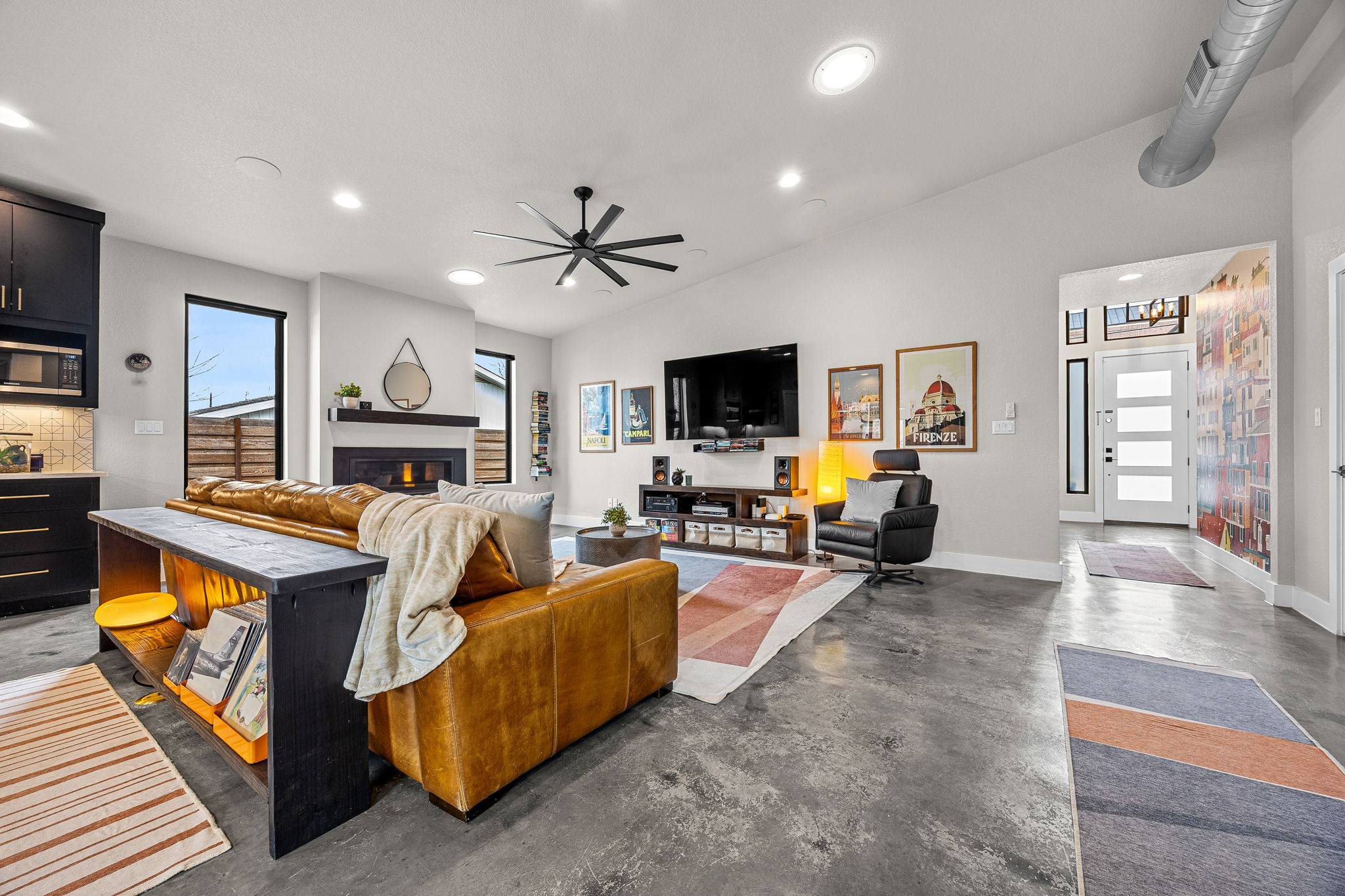 408 Martin Luther King Jr Street Georgetown, TX 78626 - Photo 4 of 35 a living room with furniture fireplace and flat screen tv