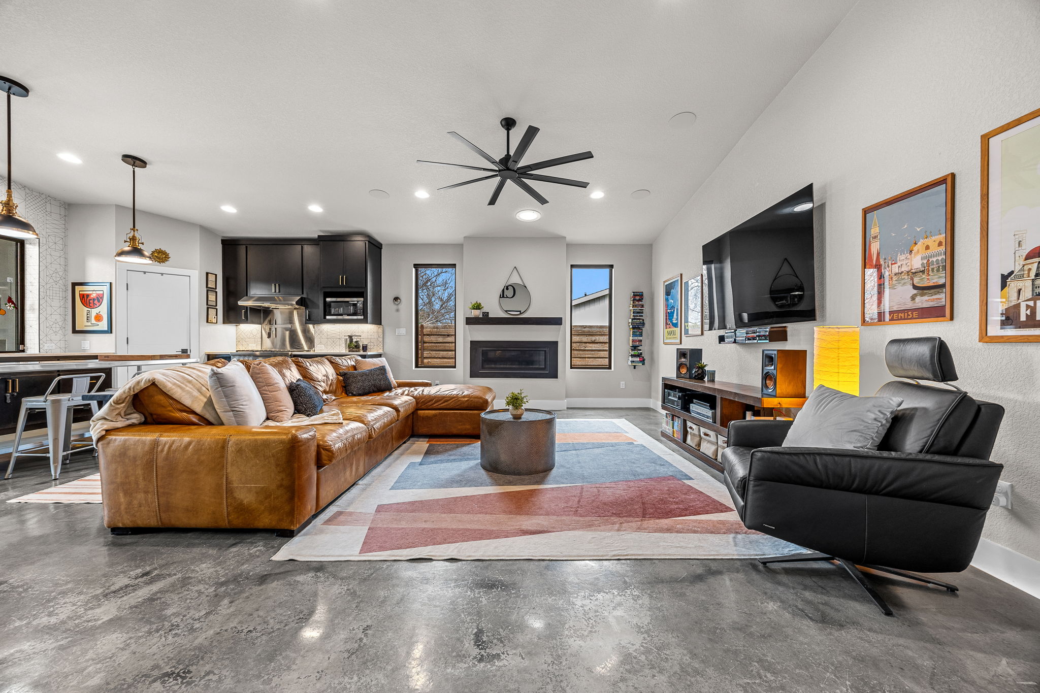 408 Martin Luther King Jr Street Georgetown, TX 78626 - Photo 6 of 35 a living room with fireplace furniture and a flat screen tv