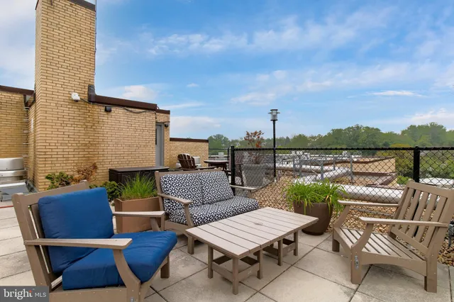 a view of a terrace with furniture