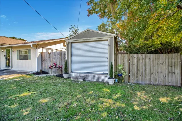 a house view with a garden space