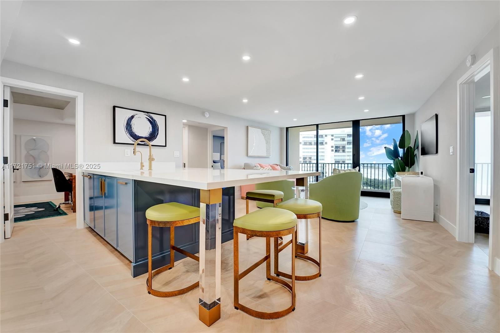 300 Ocean Trail Way, Unit 702 Jupiter, FL 33477 - Photo 3 of 30 a living room with furniture and kitchen view
