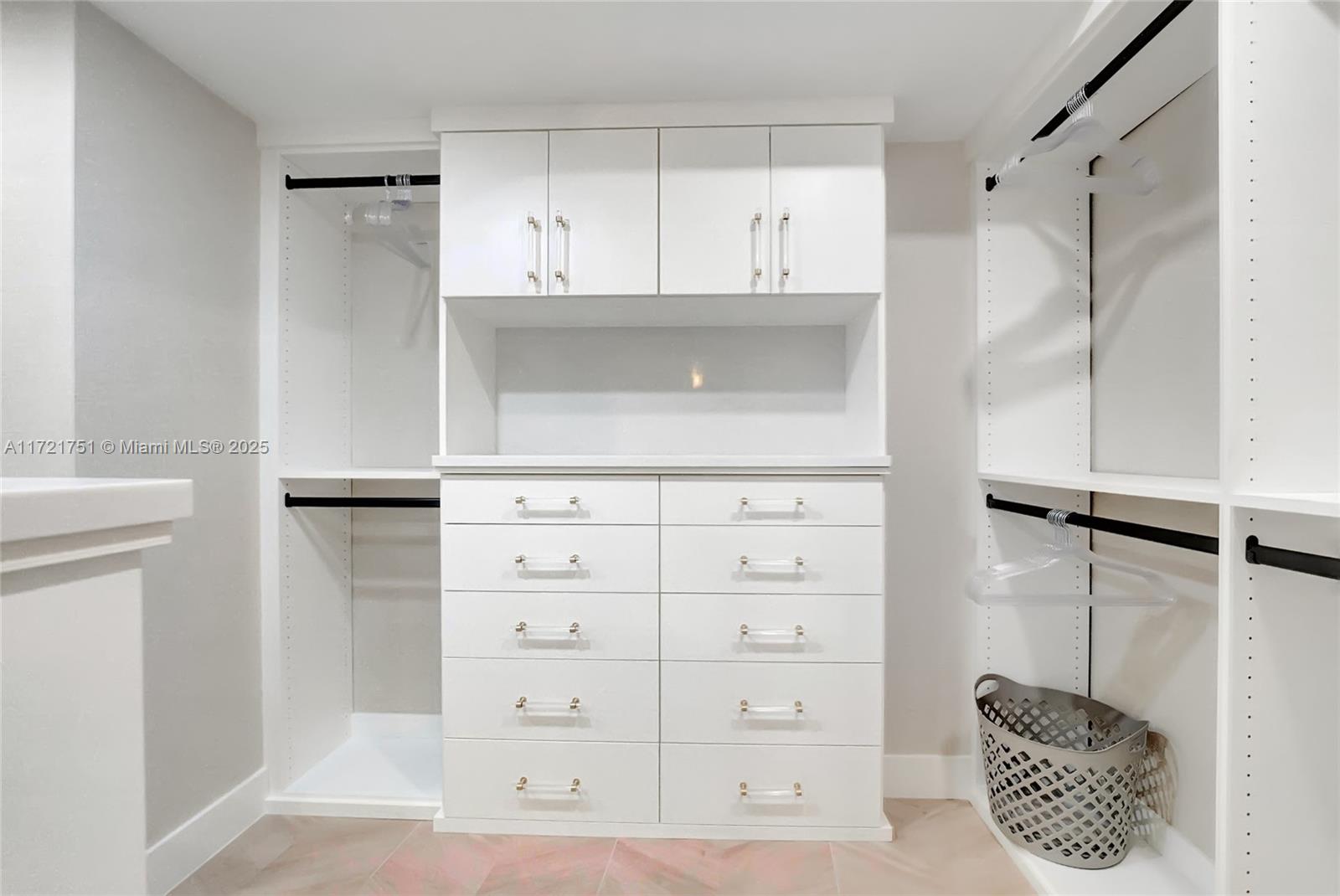 300 Ocean Trail Way, Unit 702 Jupiter, FL 33477 - Photo 10 of 30 a kitchen with a refrigerator a sink and cabinets