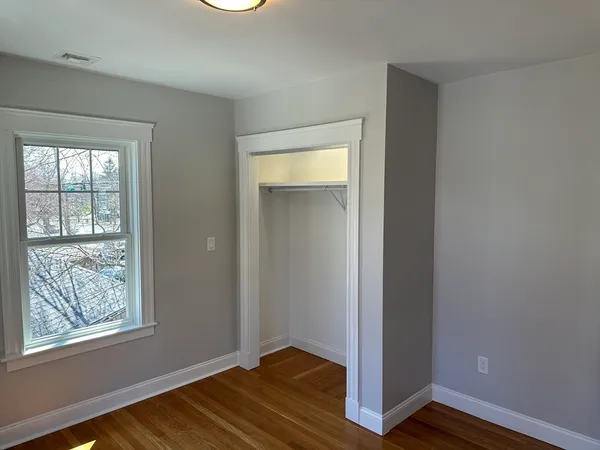 a view of an empty room and window