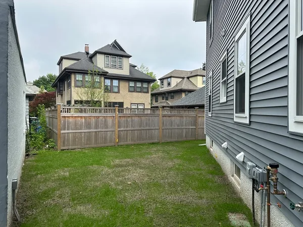 a view of a back yard of the house