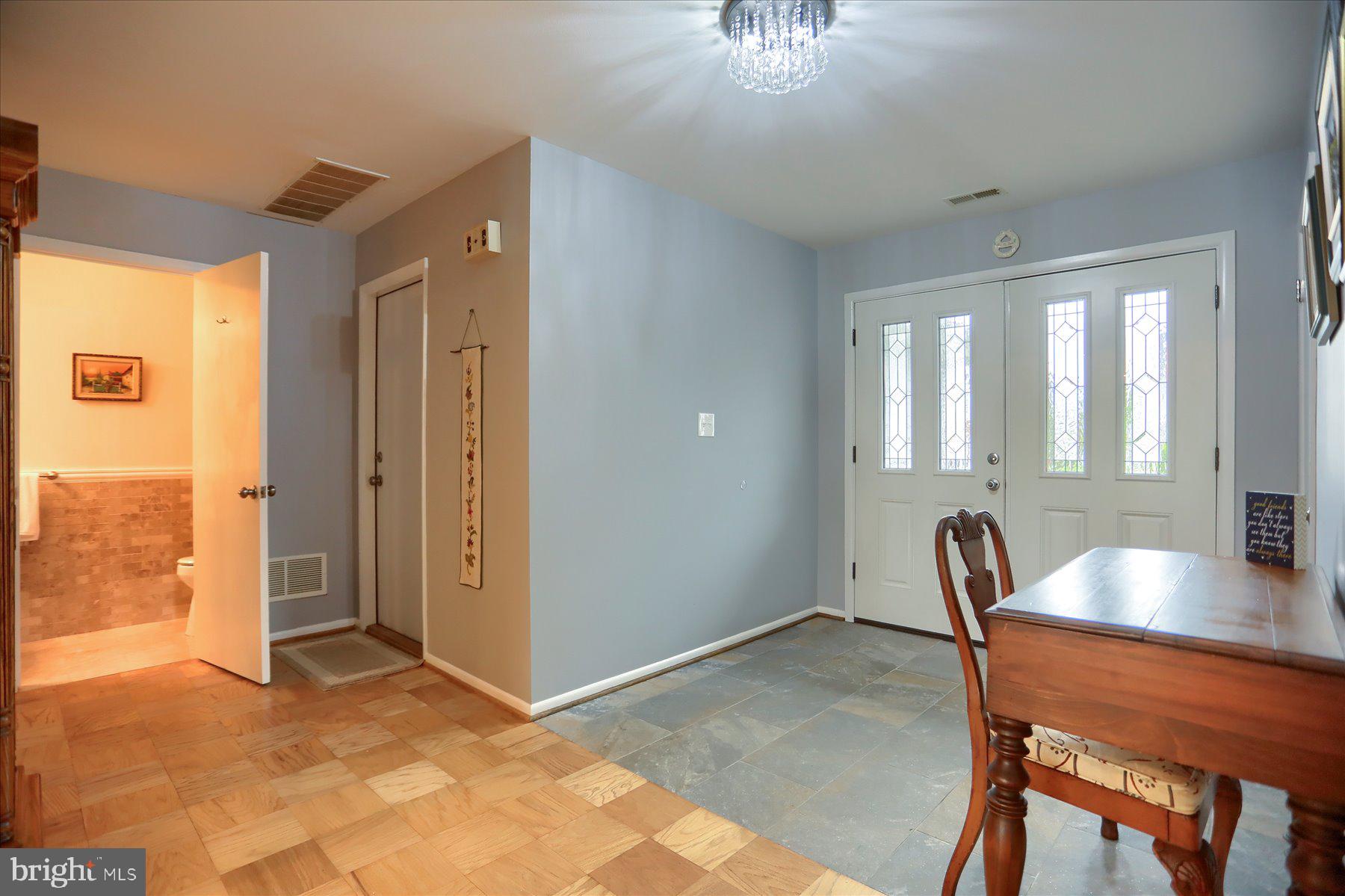 24 Neptune Drive Joppa, MD 21085 - Photo 11 of 70 a view of a livingroom with a dining table and chairs