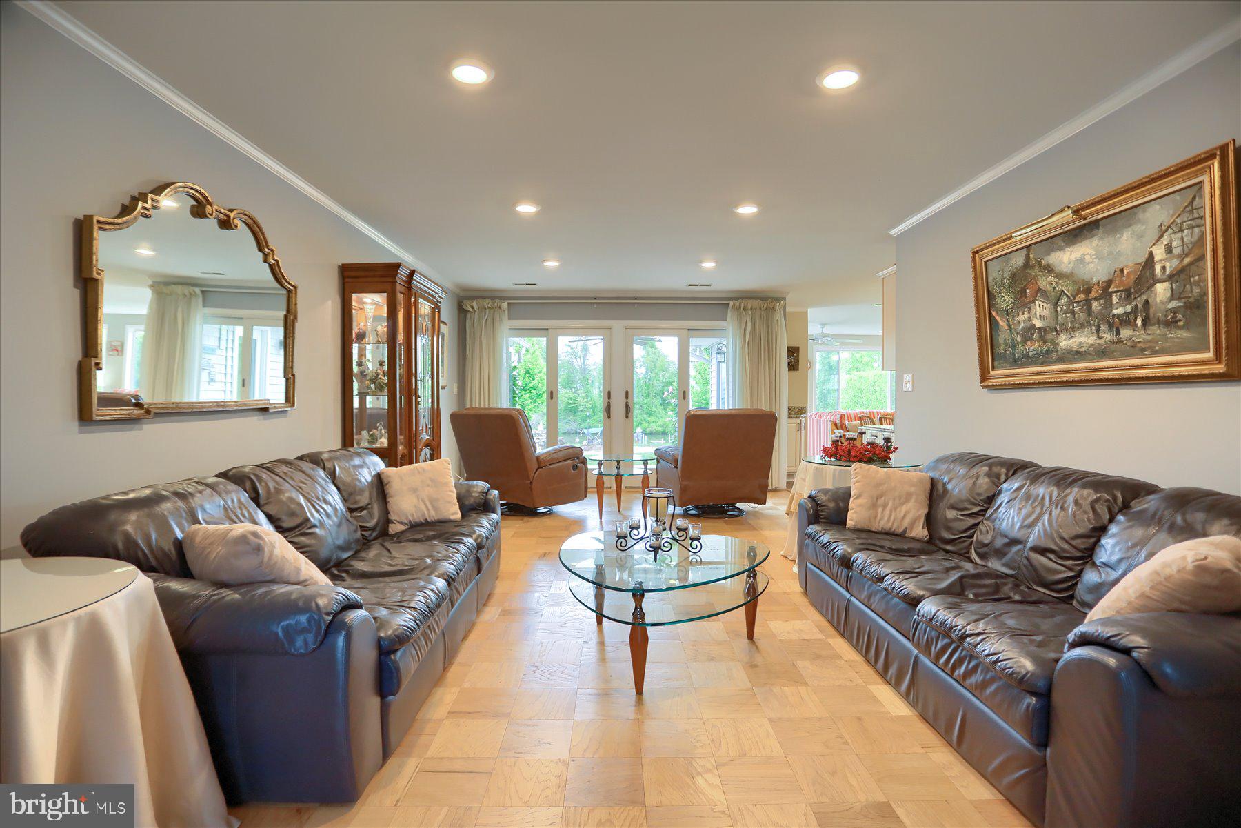24 Neptune Drive Joppa, MD 21085 - Photo 12 of 70 a living room with furniture and a wooden floor