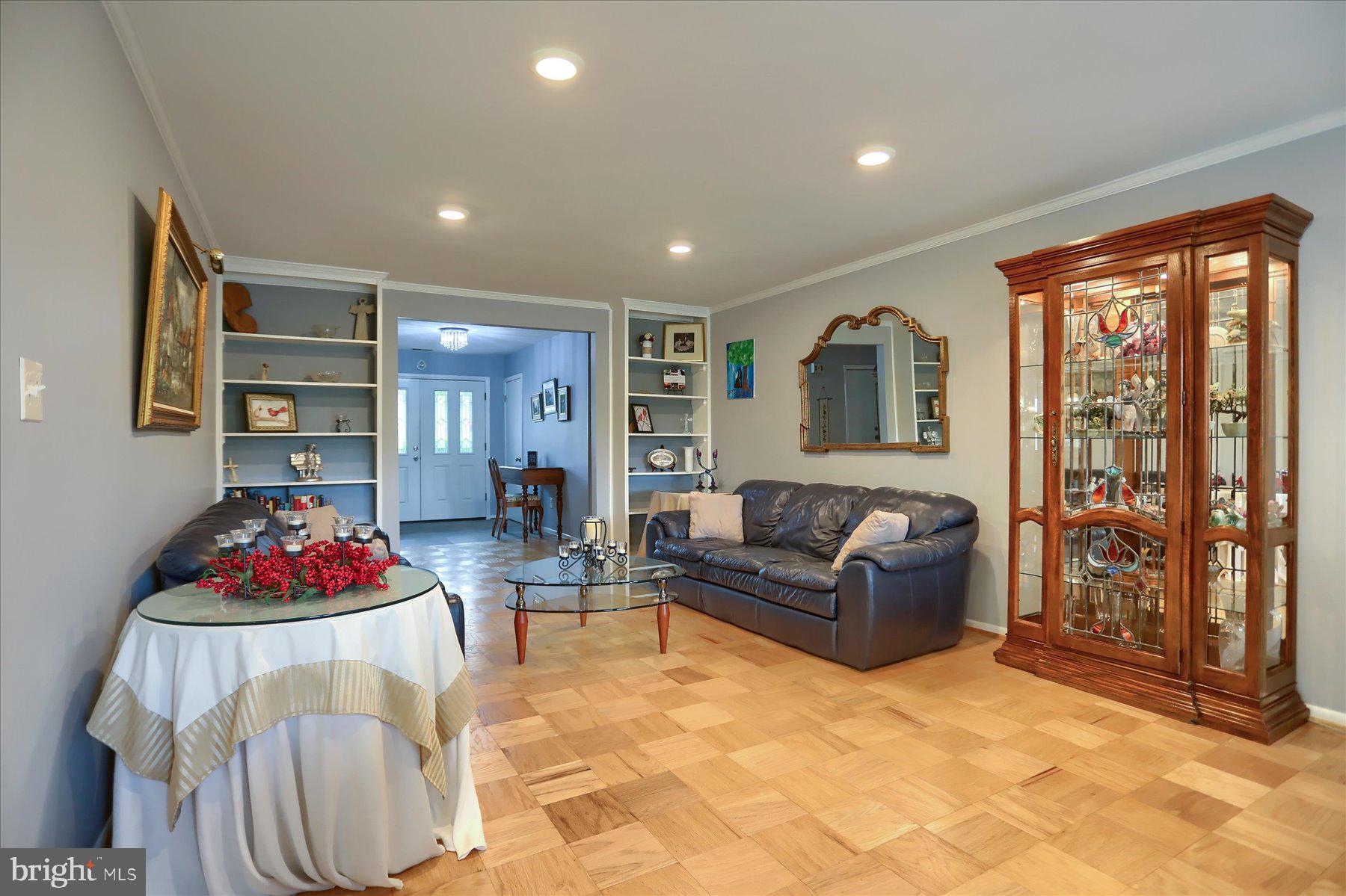 24 Neptune Drive Joppa, MD 21085 - Photo 15 of 70 a living room with furniture and a floor to ceiling window
