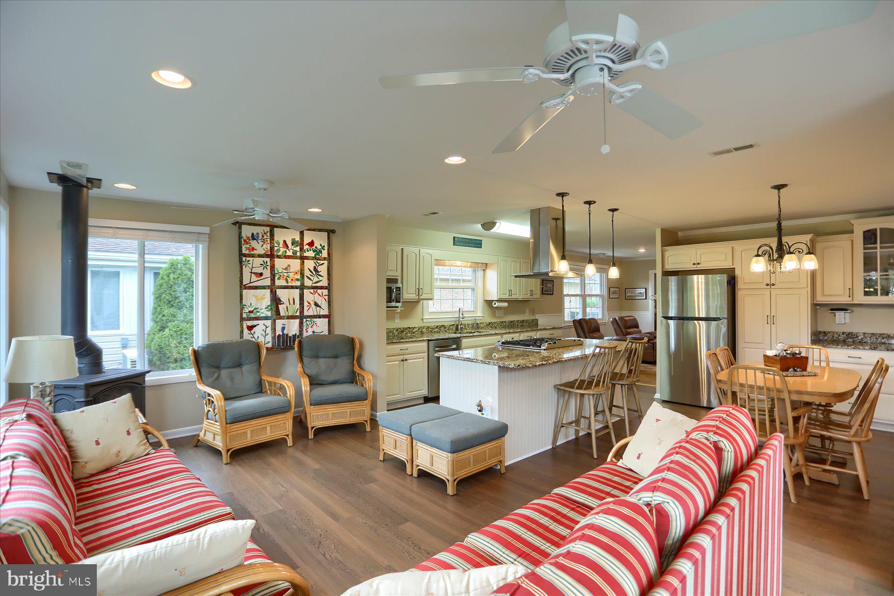 24 Neptune Drive Joppa, MD 21085 - Photo 25 of 70 a living room with lots of furniture and white walls