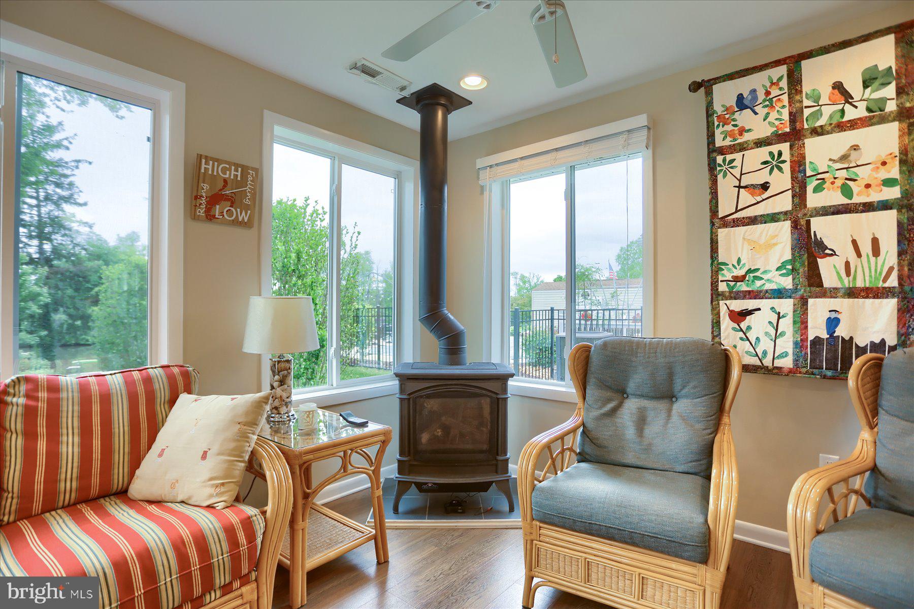 24 Neptune Drive Joppa, MD 21085 - Photo 27 of 70 a living room with furniture fireplace and a large window