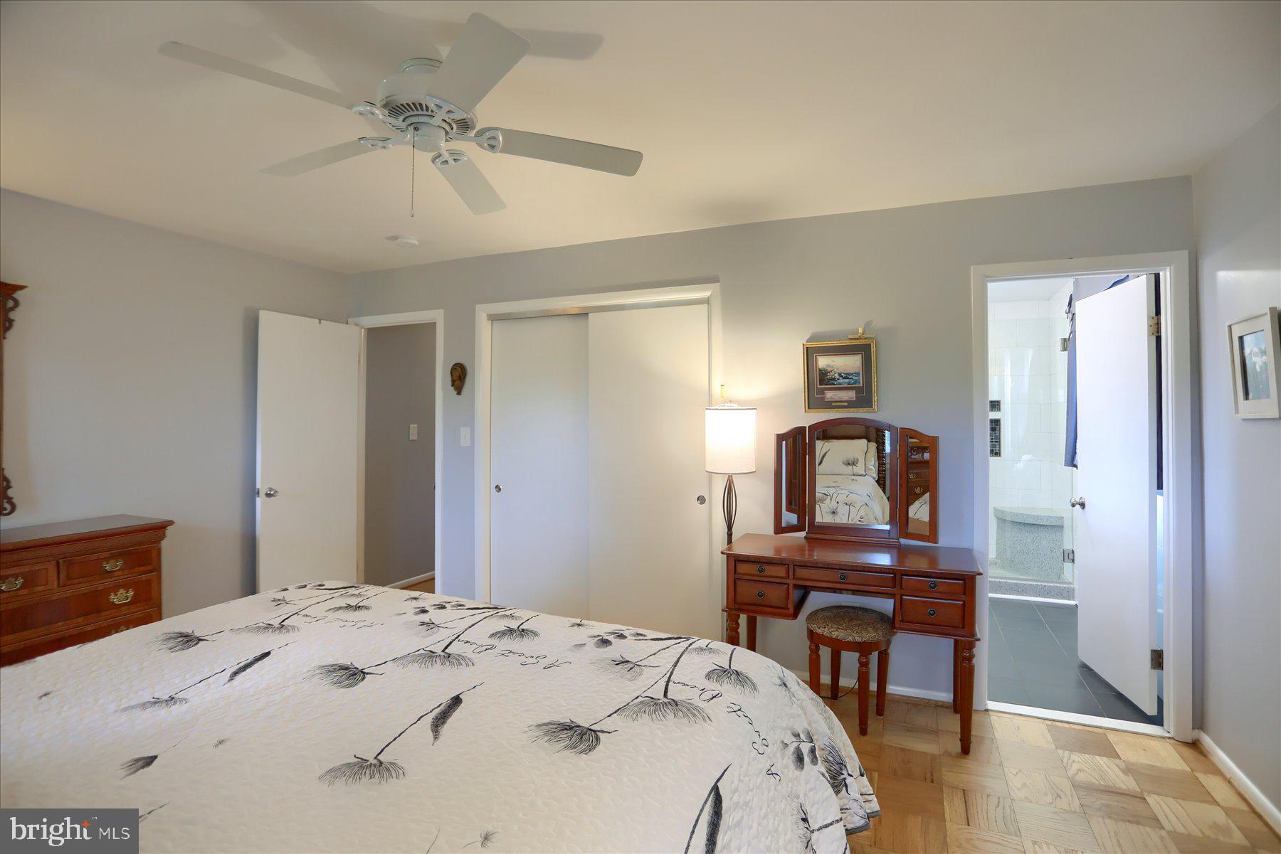 24 Neptune Drive Joppa, MD 21085 - Photo 28 of 70 a bedroom with a bed and a desk in it
