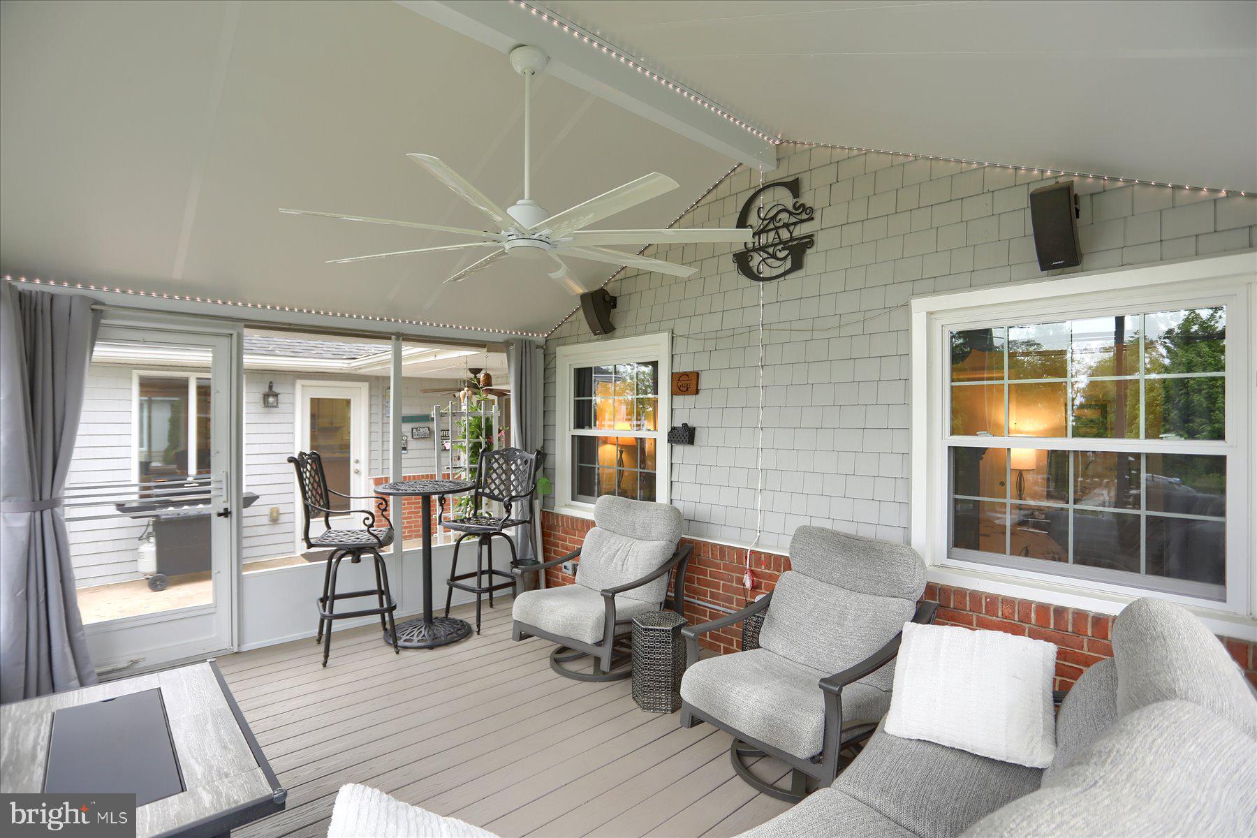 24 Neptune Drive Joppa, MD 21085 - Photo 42 of 70 a living room with furniture and floor to ceiling windows
