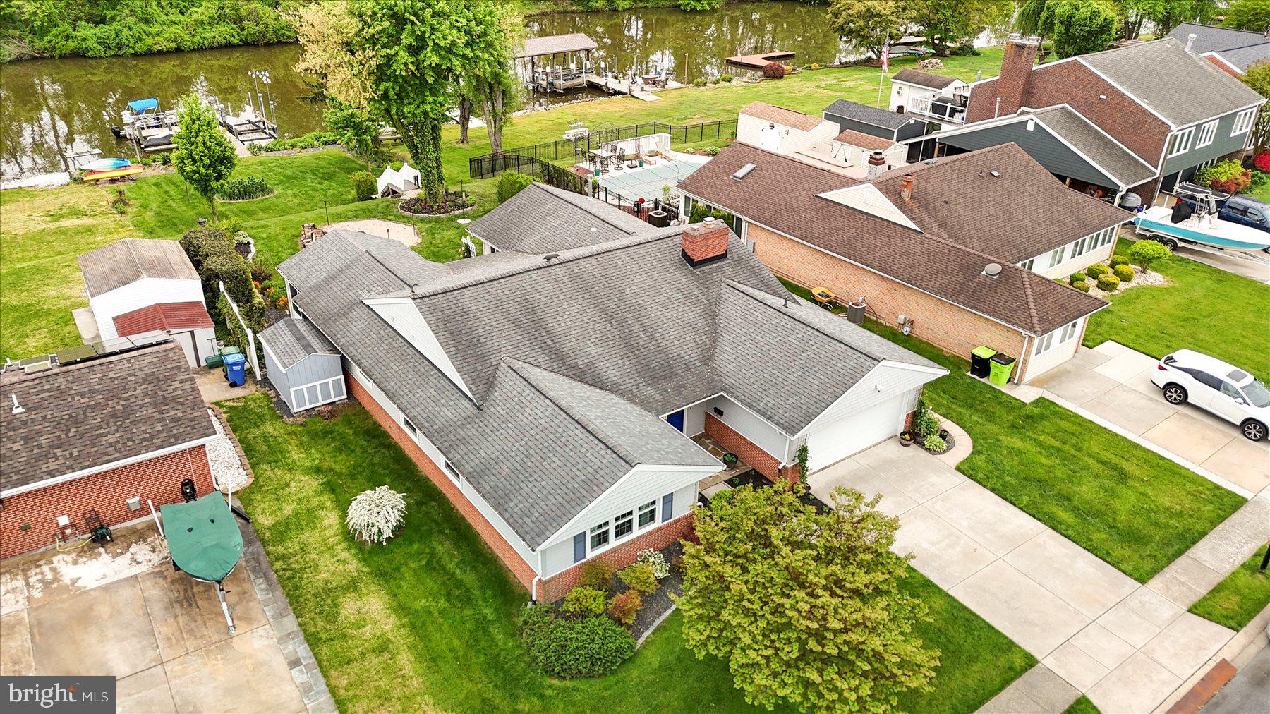 24 Neptune Drive Joppa, MD 21085 - Photo 54 of 70 an aerial view of a house with a garden and lake view
