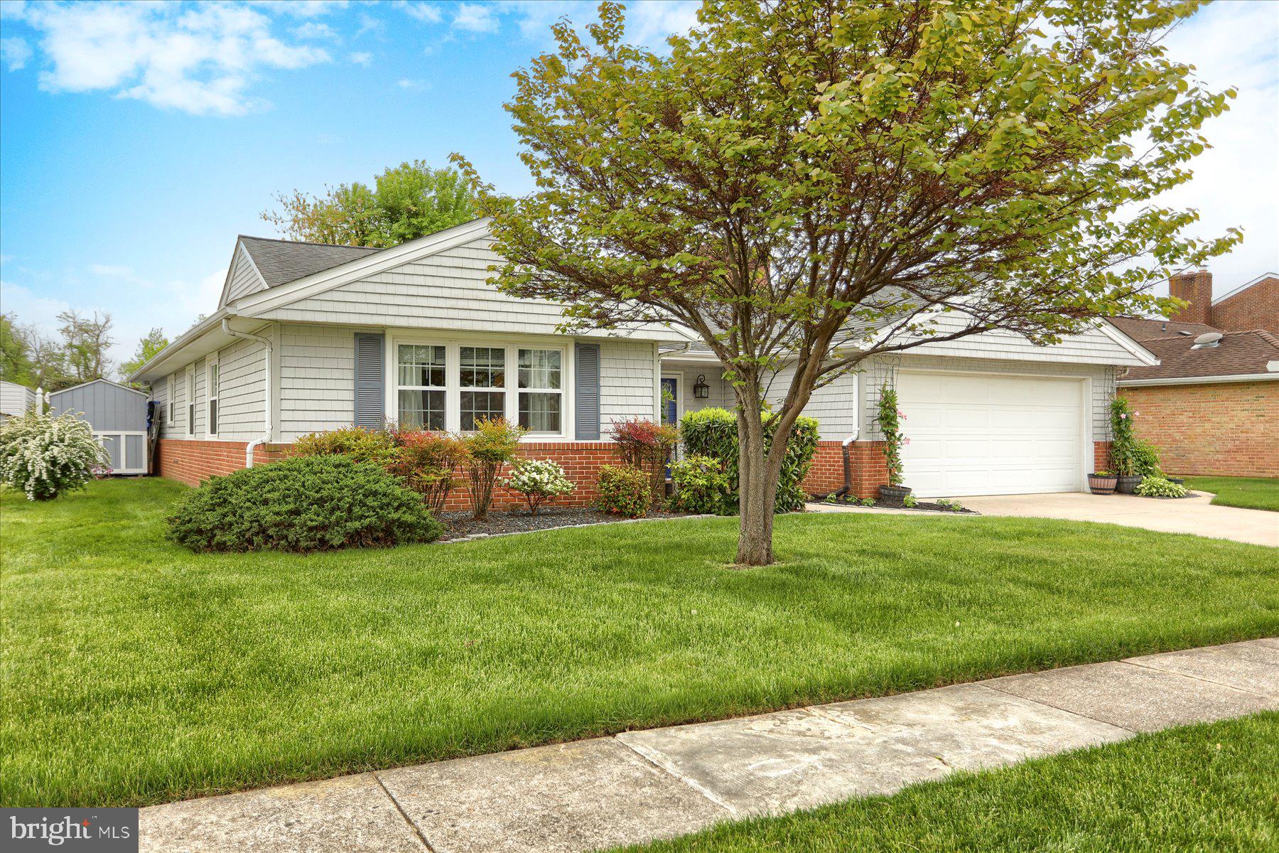 24 Neptune Drive Joppa, MD 21085 - Photo 6 of 70 a front view of a house with a garden
