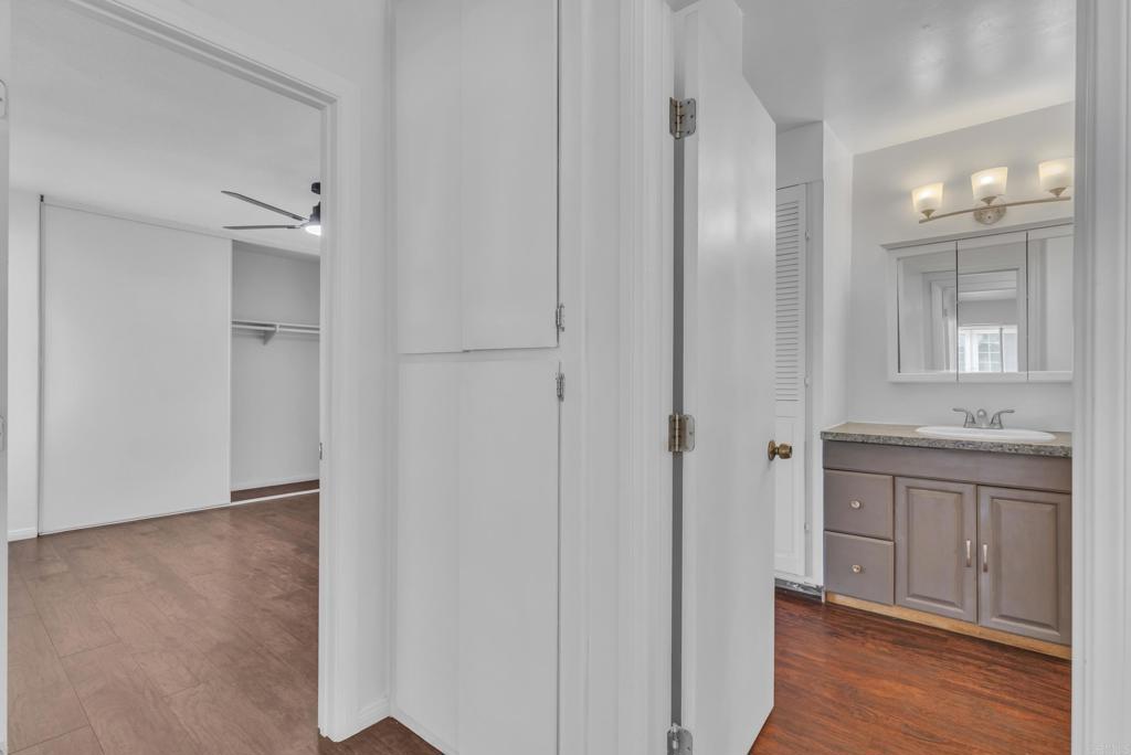 237 Rancho Drive, Unit C Chula Vista, CA 91911 - Photo 14 of 23 a bathroom with a granite countertop sink and a mirror