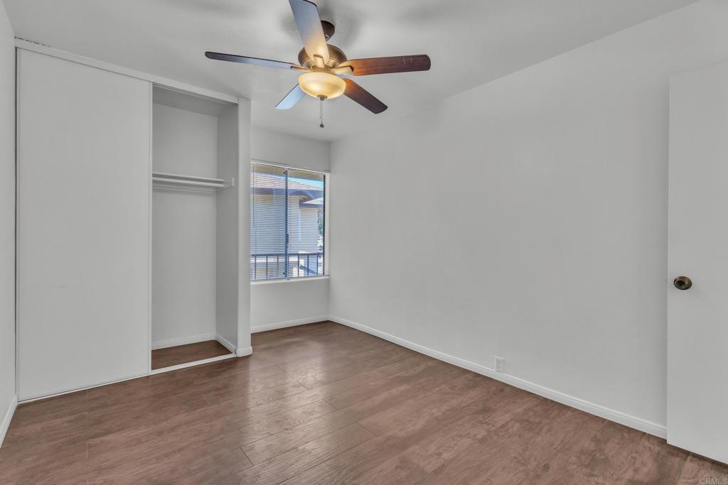 237 Rancho Drive, Unit C Chula Vista, CA 91911 - Photo 8 of 23 wooden floor in an empty room