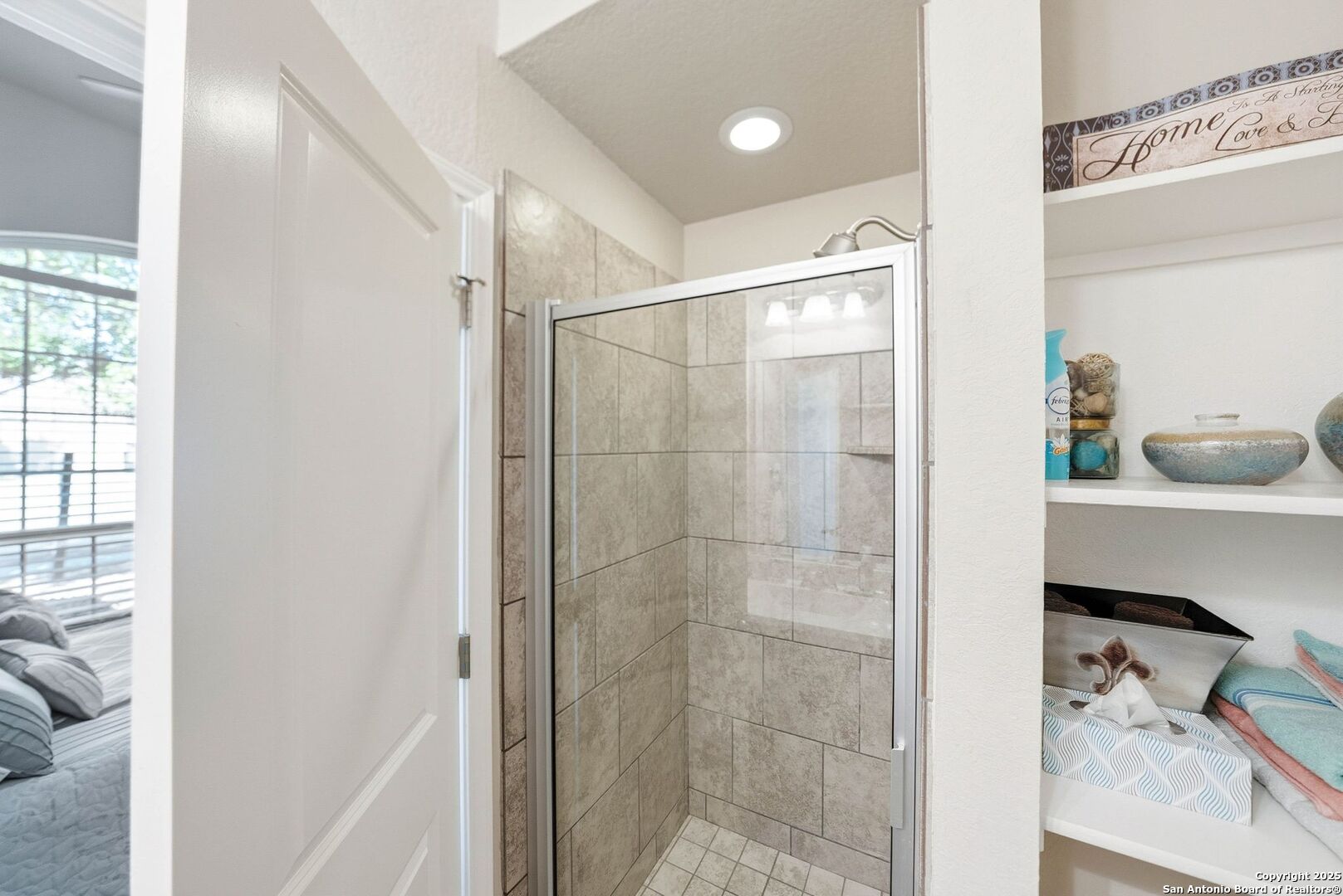 30622 Horseshoe Path Bulverde, TX 78163 - Photo 15 of 44 a bathroom with a shower and a sink