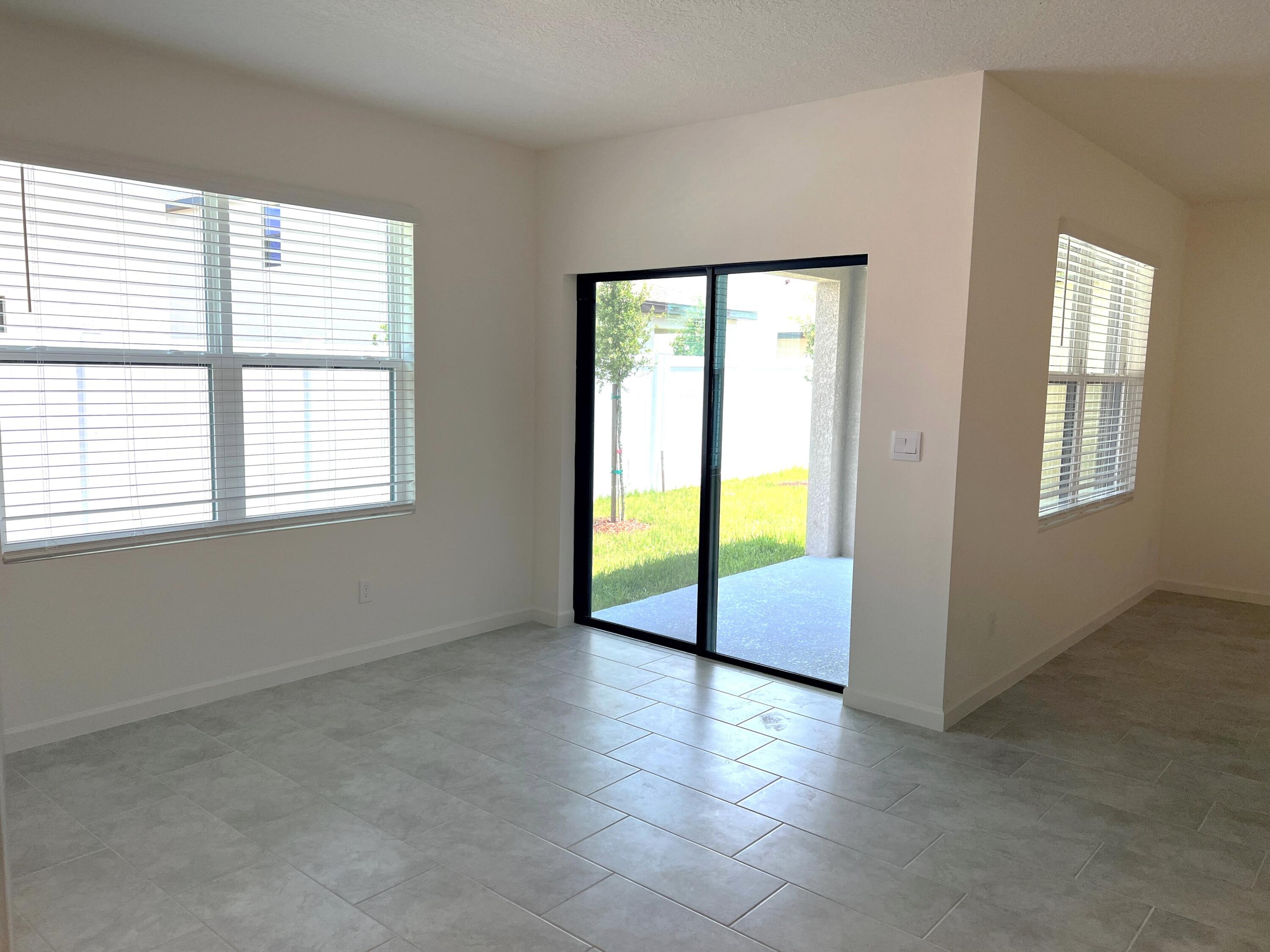 498 Seaspray Drive Fort Pierce, FL 34945 - Photo 12 of 38 Dining.Porch2
