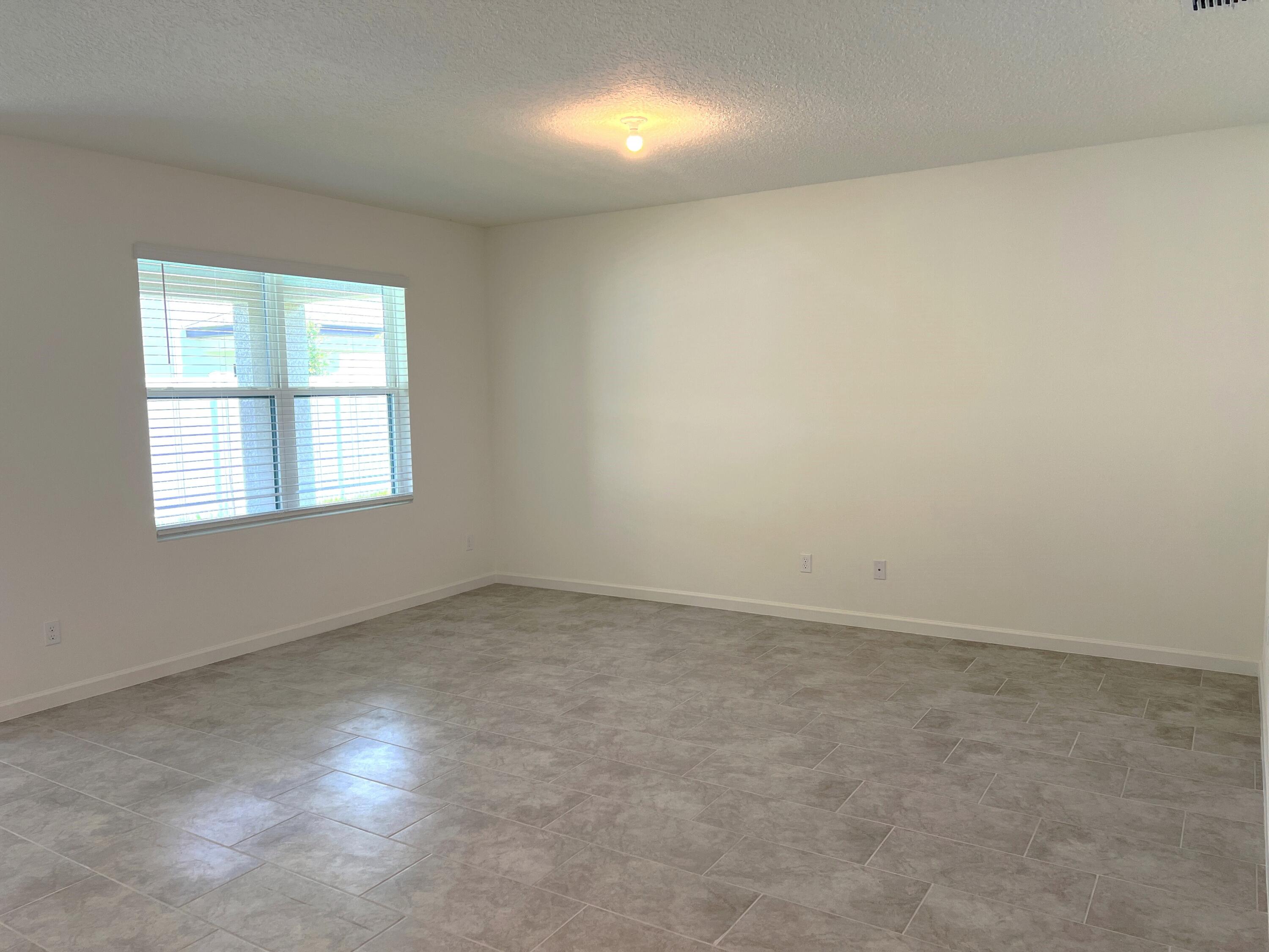 498 Seaspray Drive Fort Pierce, FL 34945 - Photo 19 of 38 Family Room1