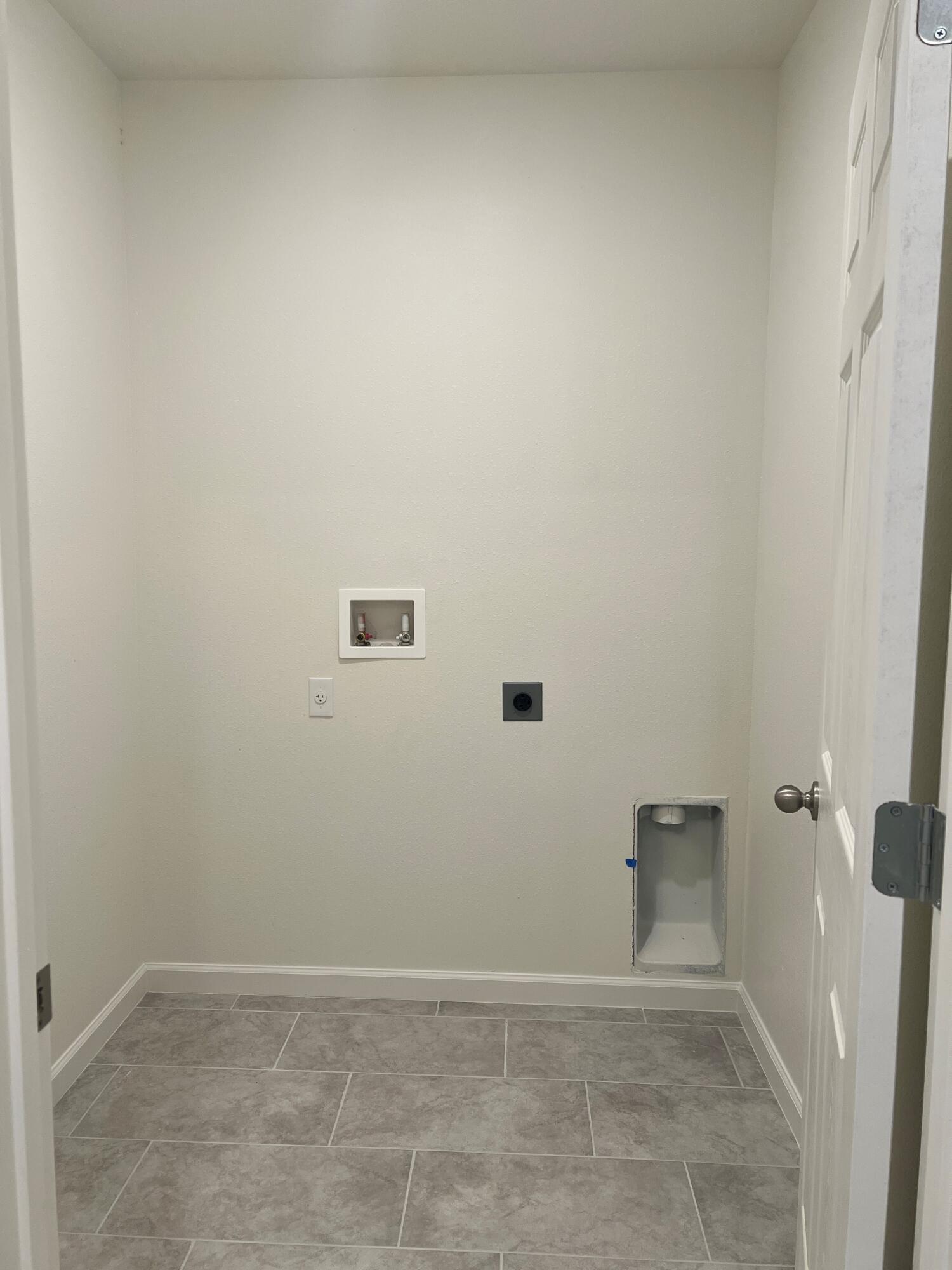 498 Seaspray Drive Fort Pierce, FL 34945 - Photo 28 of 38 Laundry Room