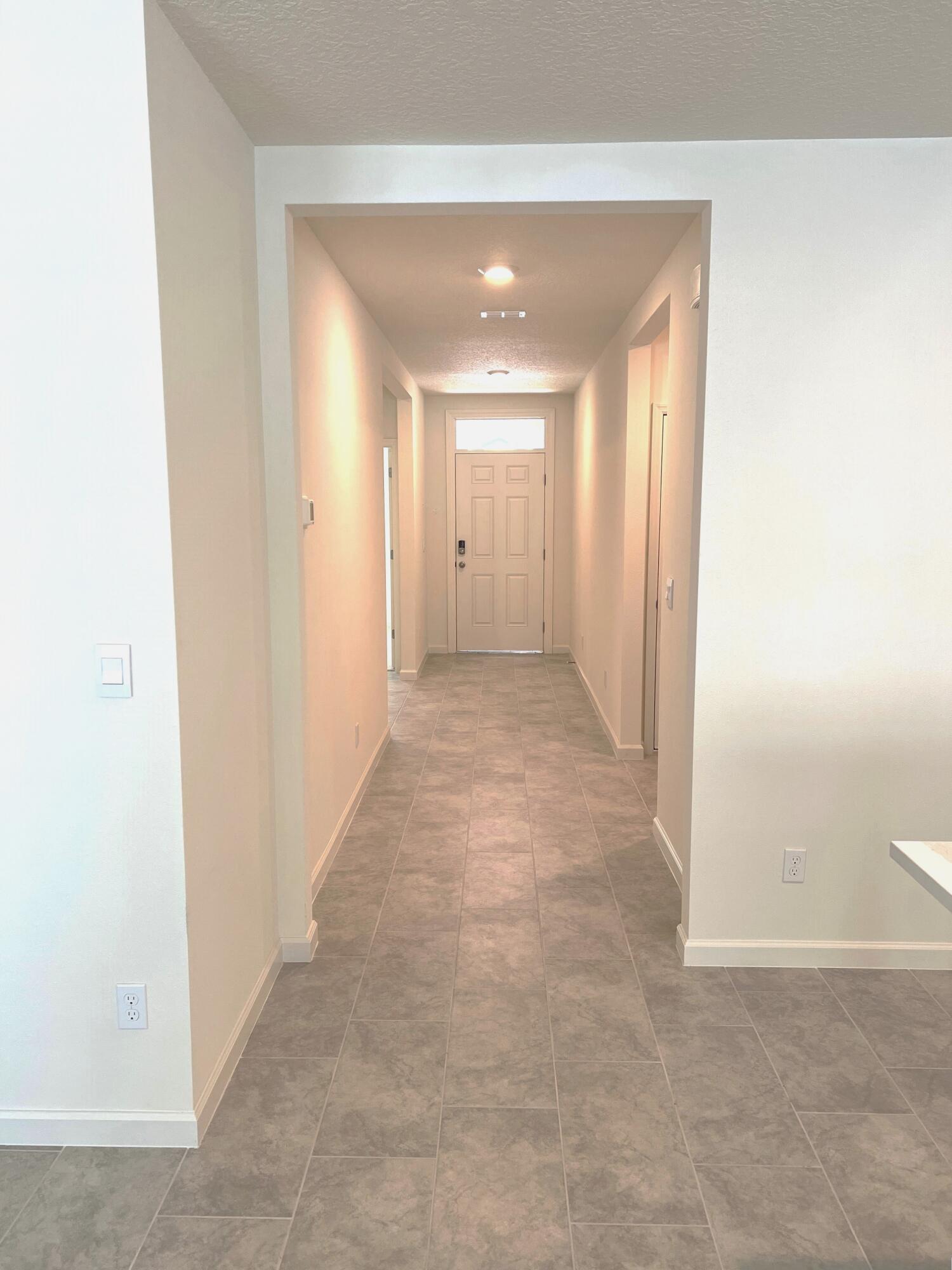 498 Seaspray Drive Fort Pierce, FL 34945 - Photo 3 of 38 Hall facing door