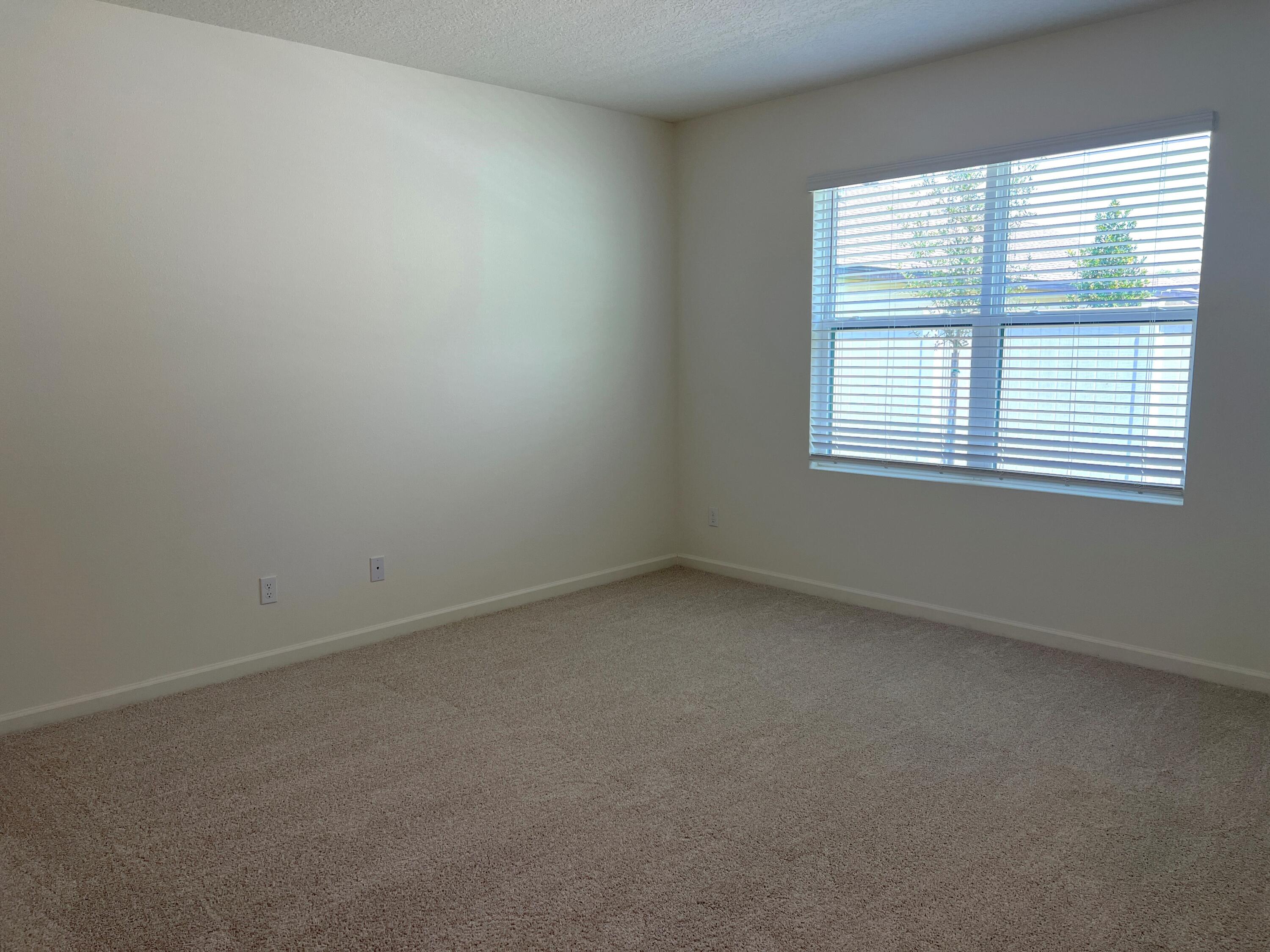 498 Seaspray Drive Fort Pierce, FL 34945 - Photo 31 of 38 Owner Bedroom1