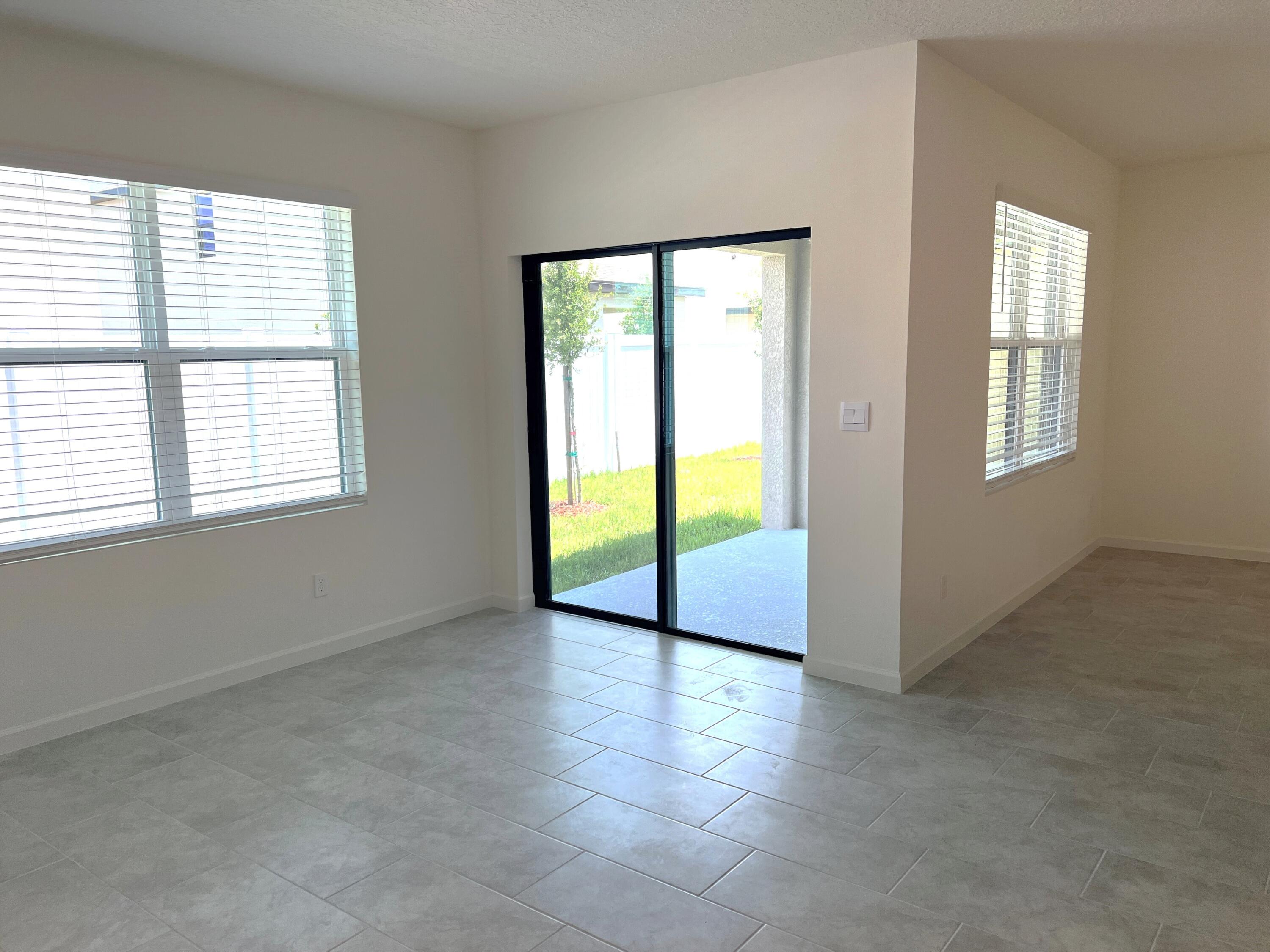 498 Seaspray Drive Fort Pierce, FL 34945 - Photo 10 of 38 Dining.Porch1
