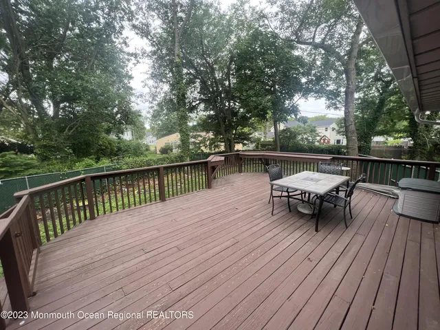 a view of back deck with patio