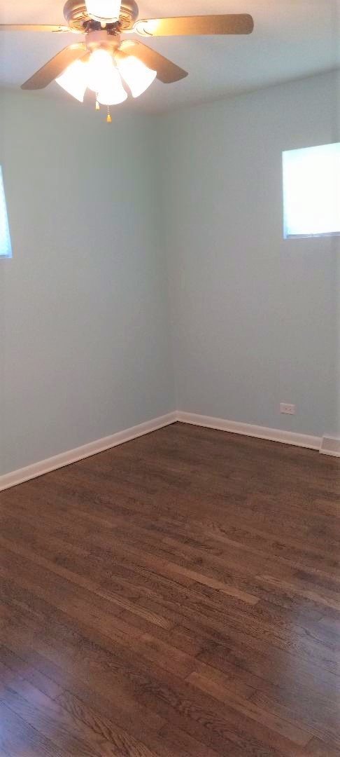 2762 Circle Drive Markham, IL 60428 - Photo 15 of 18 a view of wooden floor and window in an empty room