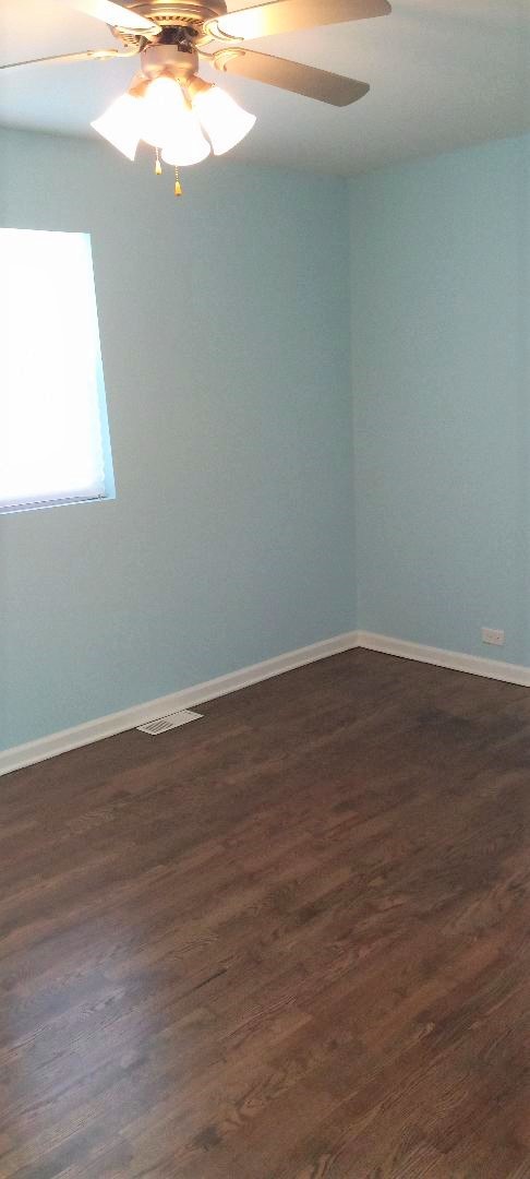 2762 Circle Drive Markham, IL 60428 - Photo 17 of 18 a view of wooden floor window in an empty room