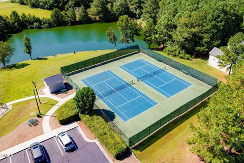 an aerial view of a pool yard patio and outdoor seating