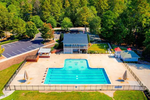 a view of a swimming pool with a garden