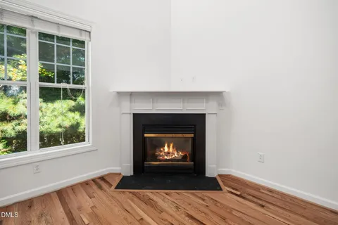 a kitchen with stainless steel appliances granite countertop a stove top oven microwave and cabinets