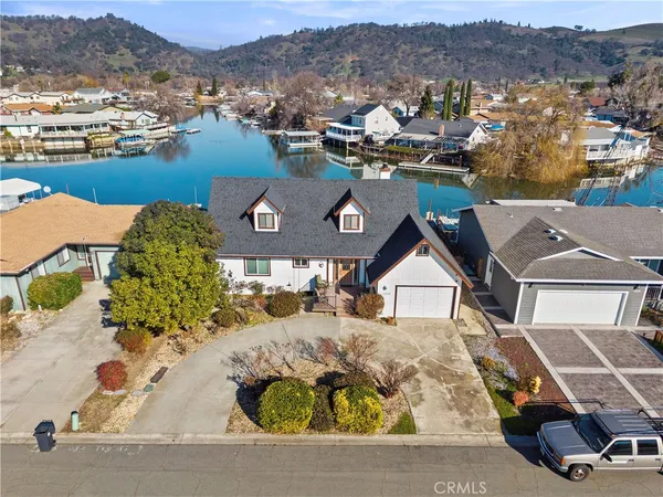 an aerial view of a house with outdoor space