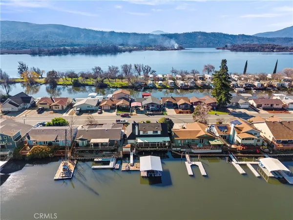 an aerial view of a house with a swimming pool