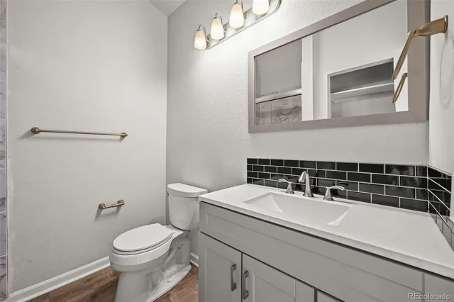 a bed room with a bed and a window