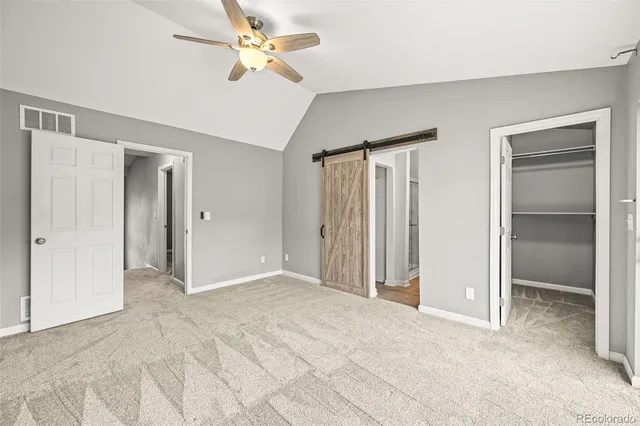 a bathroom with a toilet and bathtub