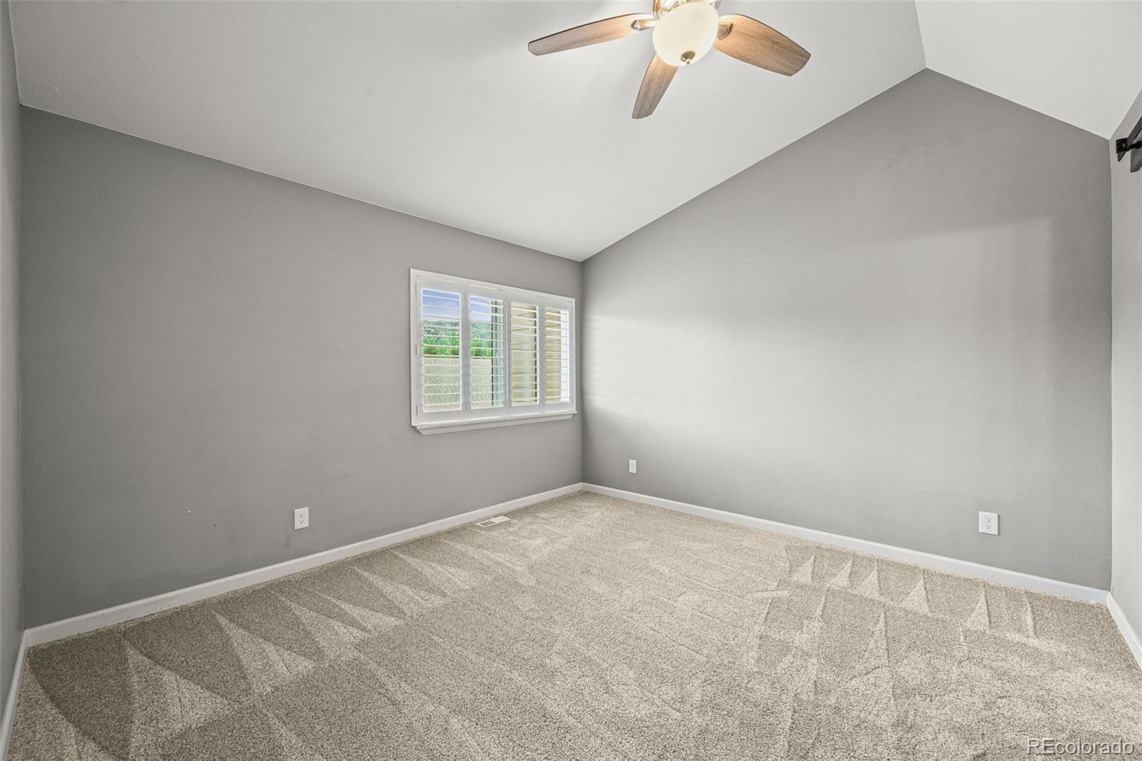 232 South Oman Road Castle Rock, CO 80104 - Photo 28 of 50 an empty room with windows and fan