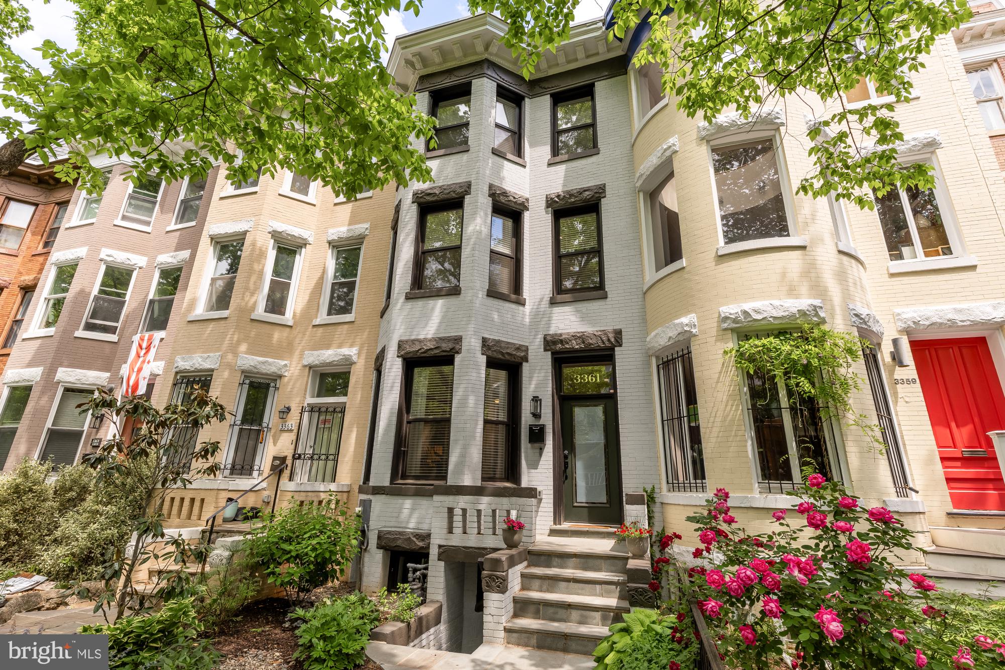 a front view of a multi story residential apartment buildings