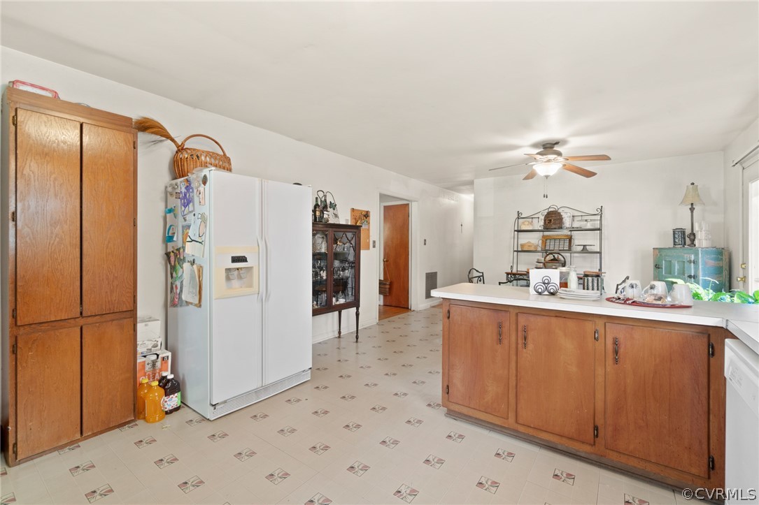 268 Old Sheppards Road Farmville, VA 23901 - Photo 15 of 37 a large kitchen with a refrigerator a sink and dishwasher