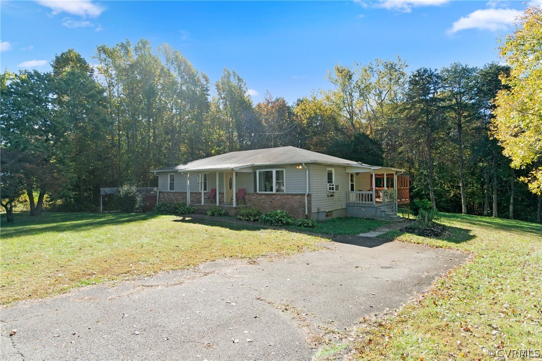 268 Old Sheppards Road Farmville, VA 23901 - Photo 2 of 37 a front view of a house with a yard