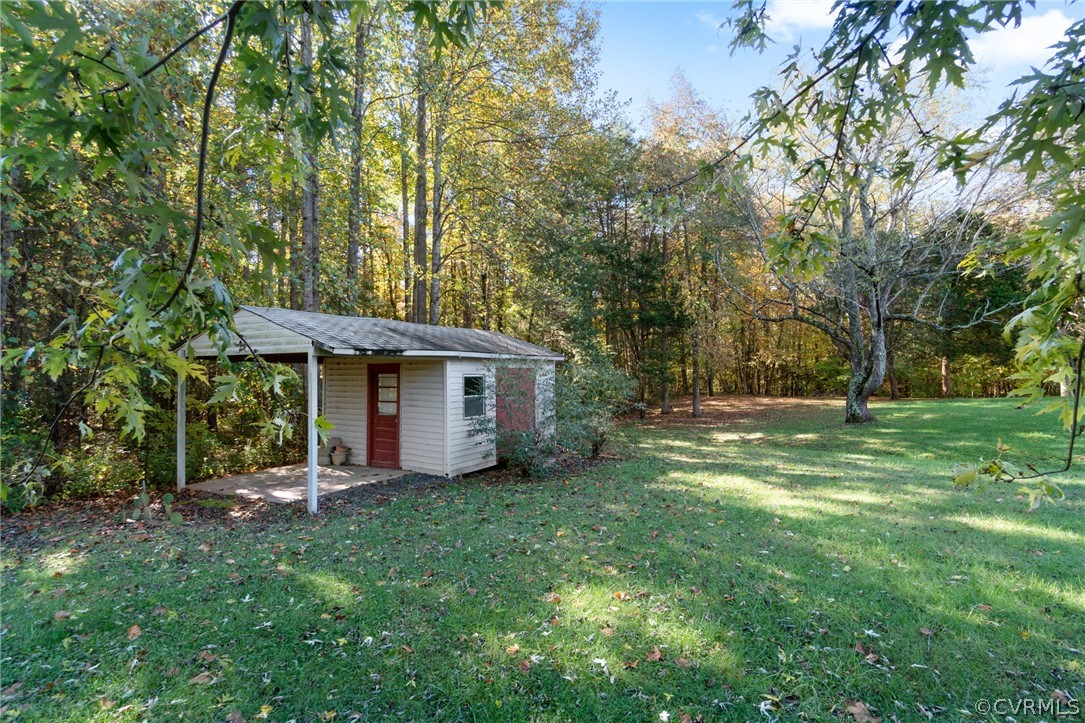 268 Old Sheppards Road Farmville, VA 23901 - Photo 21 of 37 a view of a house with backyard and a tree