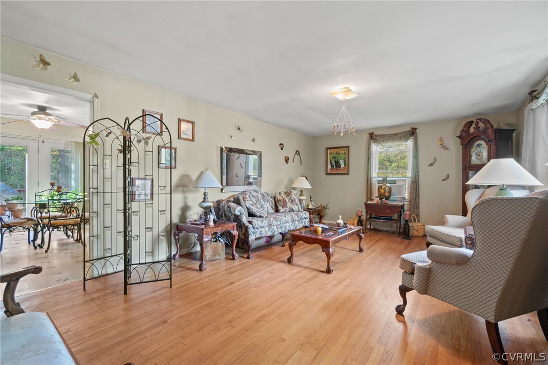 268 Old Sheppards Road Farmville, VA 23901 - Photo 5 of 37 a living room with furniture a dining table and a large window
